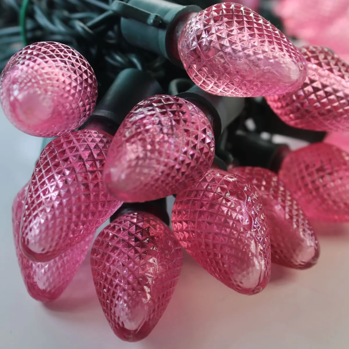 25-light C7 Pink LED Christmas Lights, 8" Spacing Green Wire