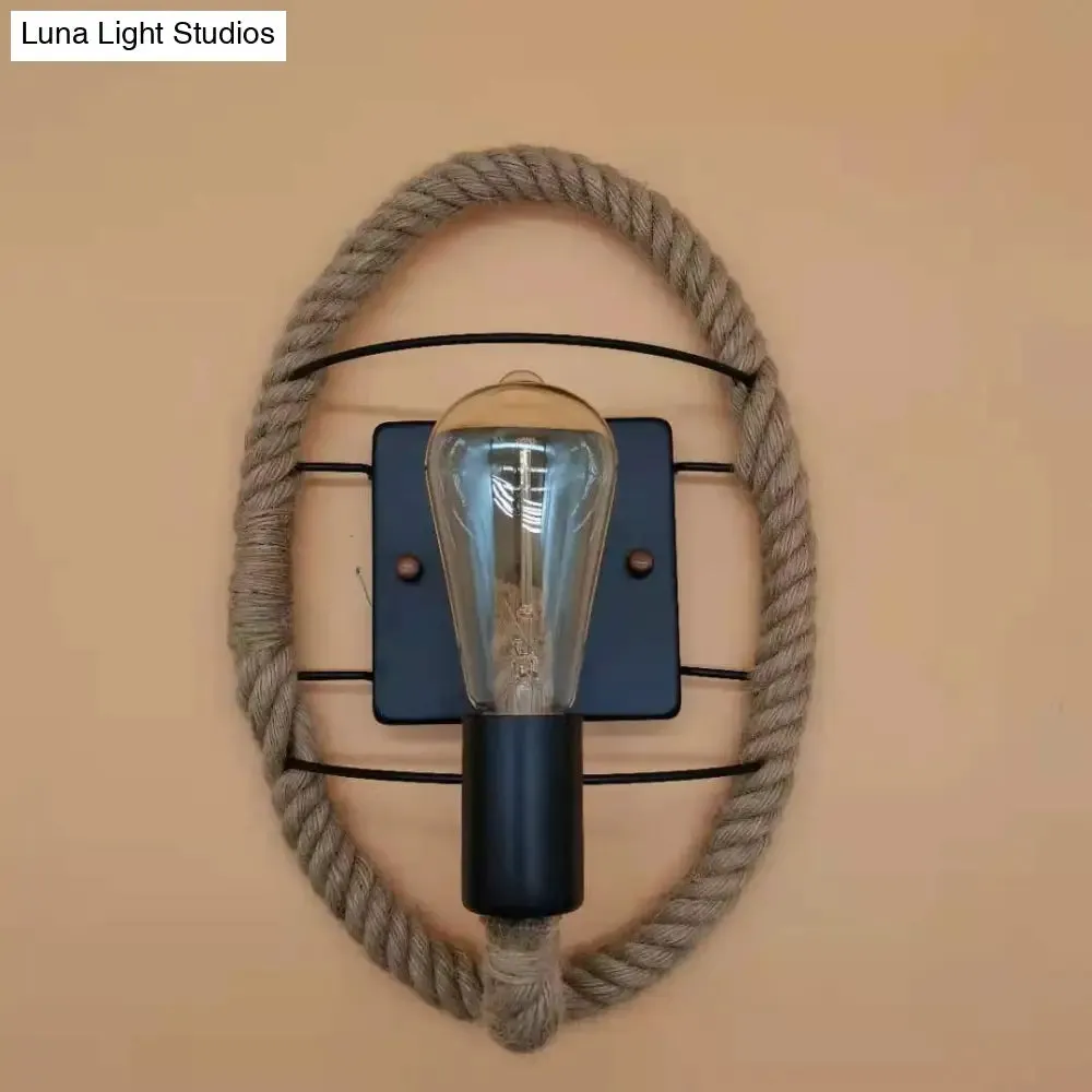 Rustic Indoor Wall Light with Wagon Wheel Design and Rope Shade